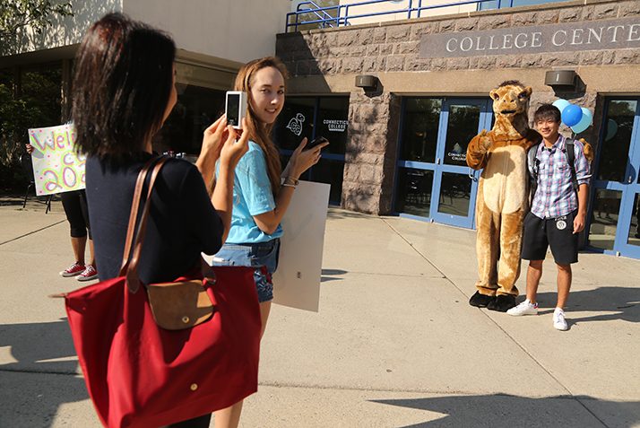 Students take pictures with the Camel